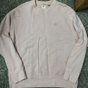 Pink Levi’s crewneck sweater